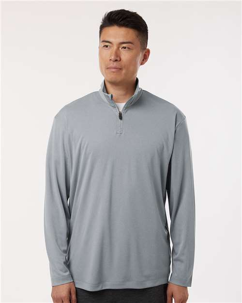 Men's gray quarter-zip pullover worn by a model